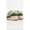 New Balance Unisex-Adult 574 Sneaker(Calcium-silver Metallic)