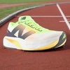 New Balance Women’s FuelCell Rebel V4 | Road Running Shoes(White/Bleached Lime Glo/Hot Mango)