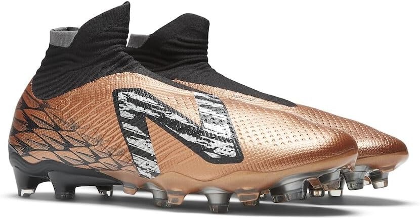 image:imageNew Balance UnisexAdult Tekela V4 Magique TfSoccer ShoeCopperBlackSilver
